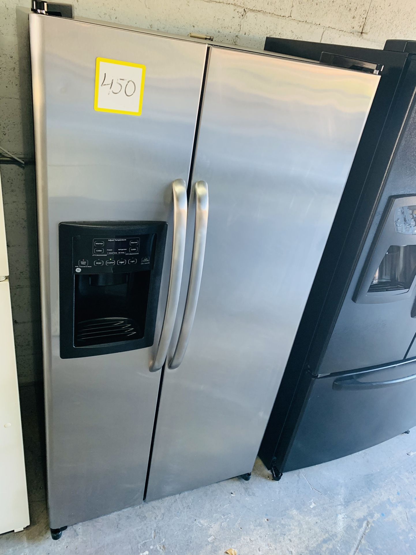 GE Stainless Steel Refrigerator In Excellent Condition Width 33” Height 66” With 4 Month’s Warranty!!