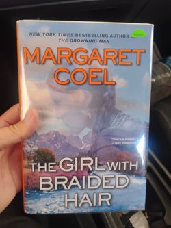 Two western books signed Margaret coel author