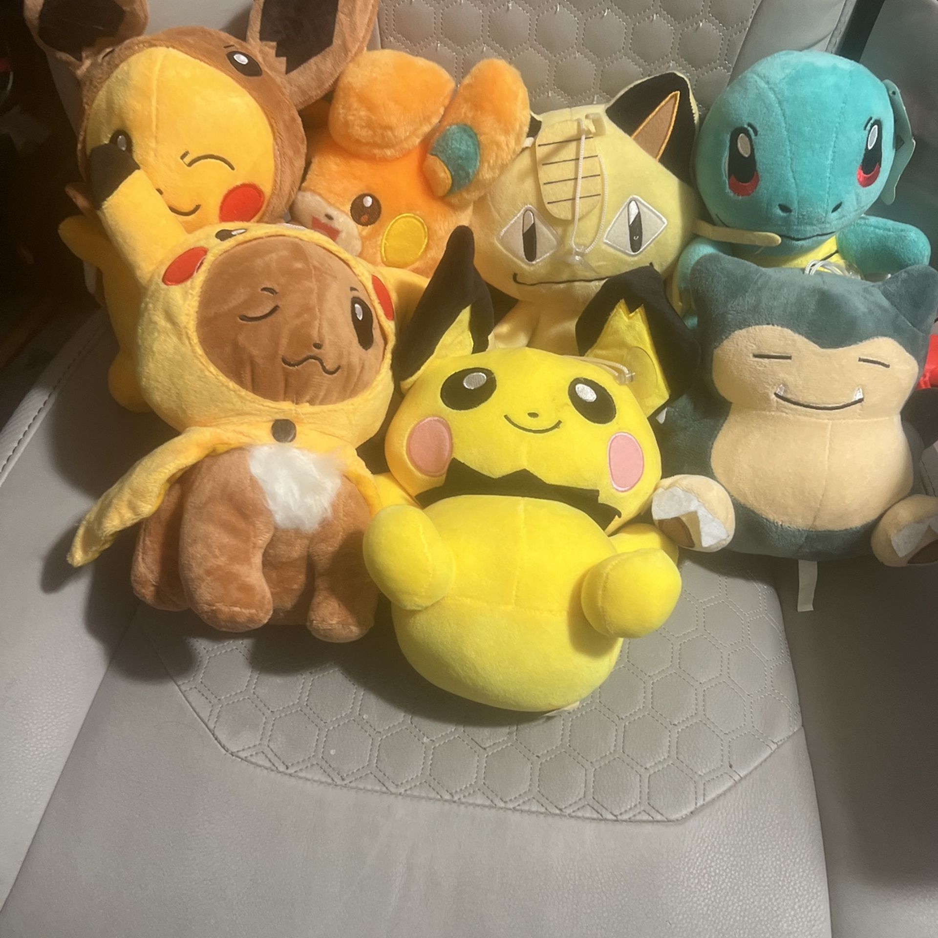 Lots Of Pokémon Plushies 
