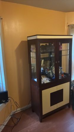 china cabinet and dinning room table and chairs