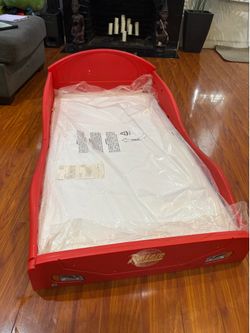 Kids bed with mattress in plastic