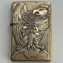 VINTAGE ZIPPO 2000 BARRETT SMYTHE HARLEY DAVIDSON EAGLE ON GLOBE SOLID BRASS USA