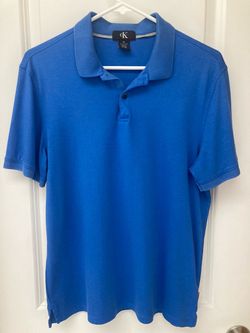 Calvin Klein polo shirt blue. Men size medium.