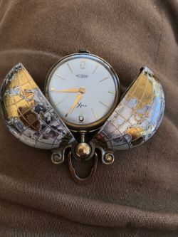 MEDANA GLOBE TIMEPIECE (antique). First $80 cash