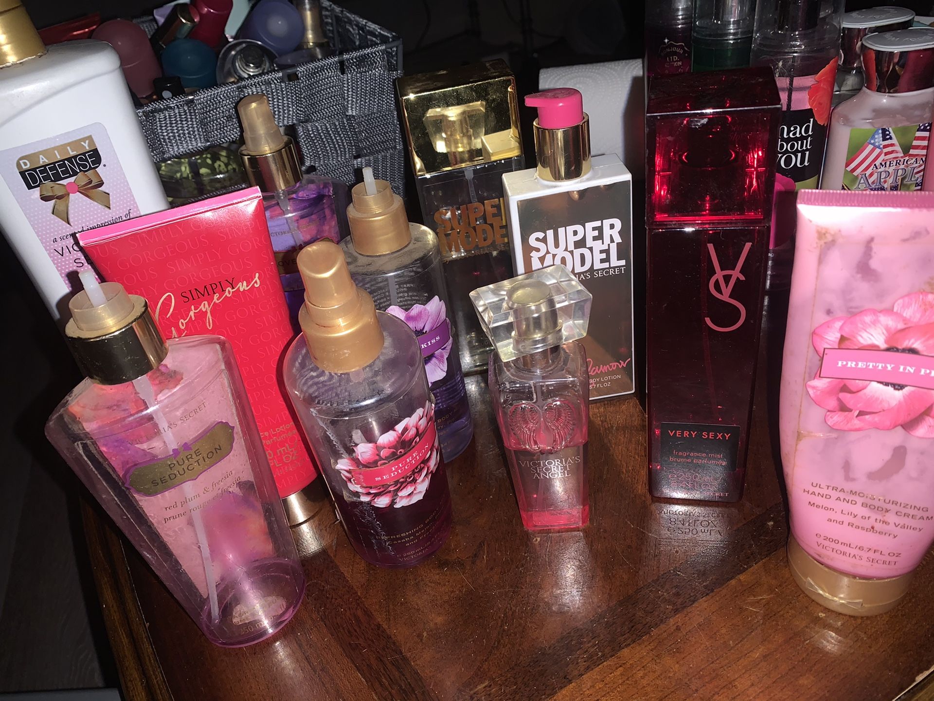 Lot of 24 lotions and perfumes