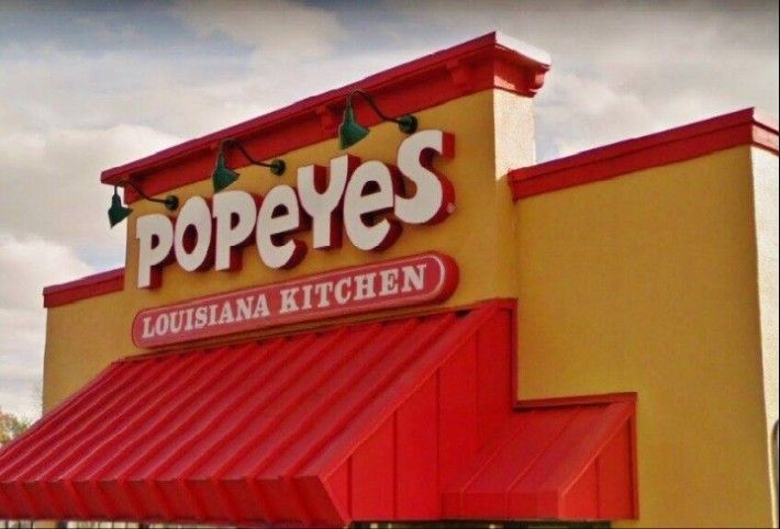 RARE ADVERTISING SIGNS POPEYES CHICKEN LOUISIANA KITCHEN