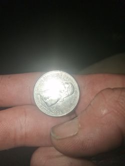 In cod we trust. Rare quarter with bell on one side