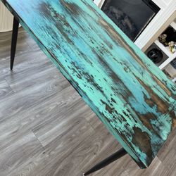 Reclaimed wood desk with steel legs