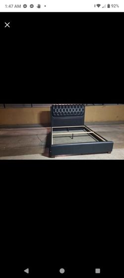 Queen Size Black Upholstered Bed Frame..