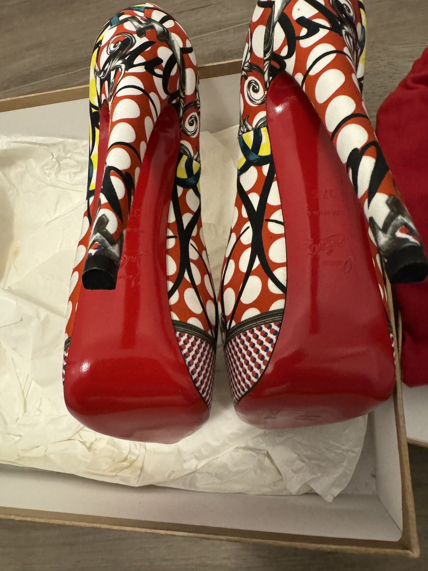 Christian Louboutin (Red Bottoms)