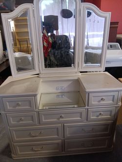 This is one beautiful dresser with mirror have nine drawers