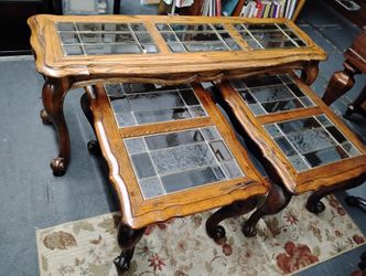 Matching wood and beveled glass end tables