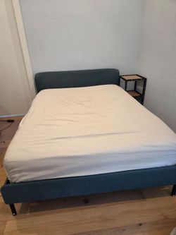 Queen bed frame- green upholstered