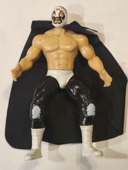 VINTAGE MEXICAN LUCHADOR. MEXICAN BOOTLEG.  (EMLL) LUCHA LIBRE LEGENDS. ARENA WRESTLERS. MIL MASCARAS 7 " ACTION FIIGURE.