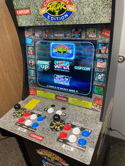 Arcade 1UP. Street Fighter II Champions edition . Works great. With riser. $275