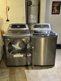 Set Stainess stee Kenmore washer machine and gas dryer everything works we deliver
