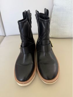 Black leather biker boots with gold buckle detail #biker #leather