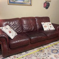 Maroon Leather couch 