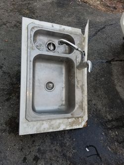 Double Sink with faucet and Garbage Disposal Need Gone