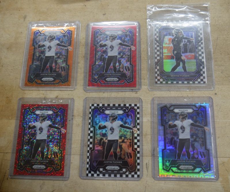 LOT 6 JUSTIN TUCKER PANINI #22 ORANGE 2023; #22 RED 2023 ; #22 RED 2023; #22 SILVER 2023; #22 CHECKERBOARD 2023; #26 CHECKERBOARD 2022.