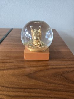 Budha snow globe