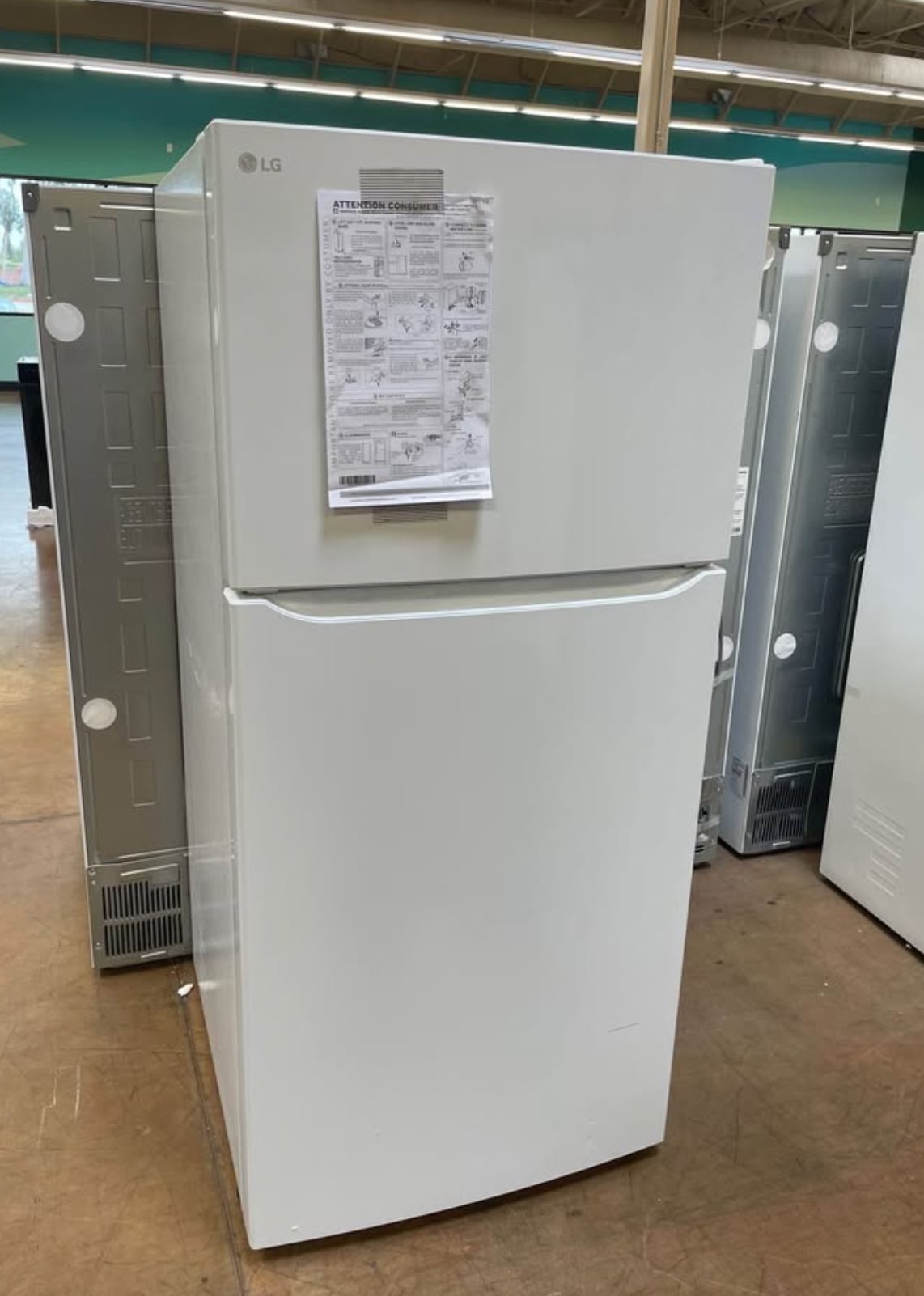 Apartment size refrigerator LG top freezer