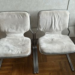 Unique metal chrome chair  Pair$400