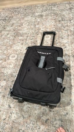 Oakley carry on roller suitcase