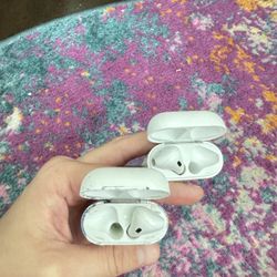 Two 1st Gen AirPods 