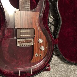 A 2007 Dan Armstrong Japan (Ampeg ADA6 Lucite) guitar