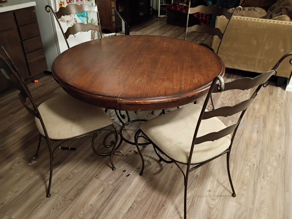 Elegant Wrought Iron and Wood Dining Set
