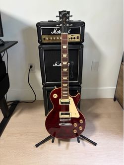 Gibson Les Paul Studio with Marshall stack amp