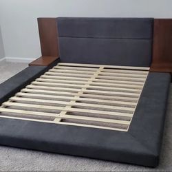 King Sized Gray Platform Bed With Built In Side Tables