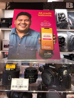Nikon EM 35mm film camera with 50mm 1.8, 35mm and lens 2x tele converter for limited time only at Downey Camera