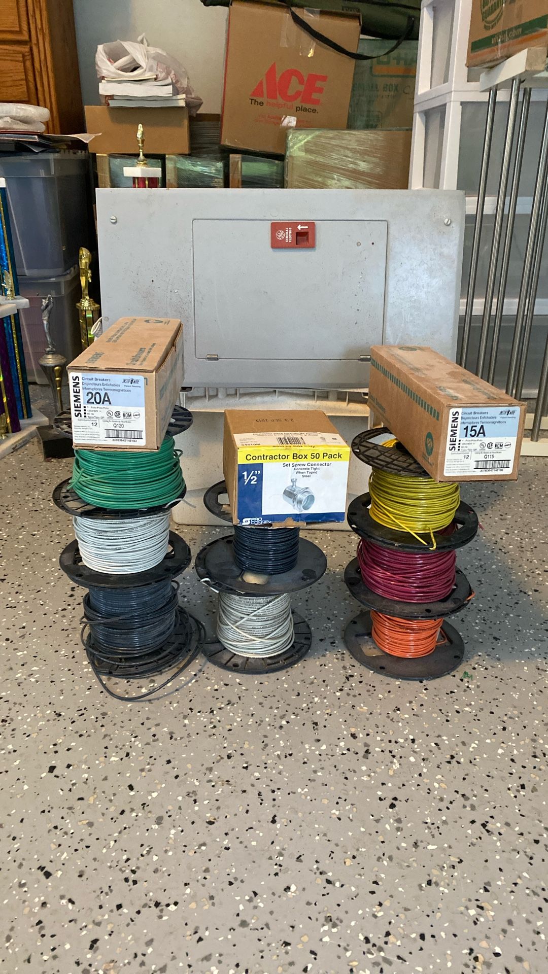 Electrical panel, circuit, breakers, and spools of wire