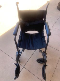 Transport wheelchair