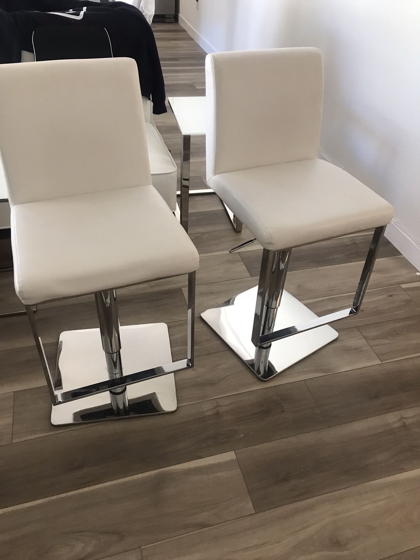 Pair of Modani Adjustable Bar/Island Stools/Chairs Please note not in mint condition-see Description and Pics
