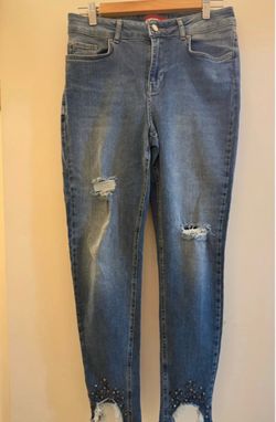 Distressed Skinny Jeans with Studded Hem