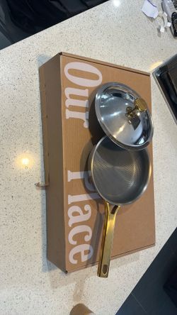 Pan and pots our place brand titanium and gold finishes