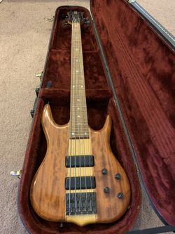Used bass guitars for sale near me deals