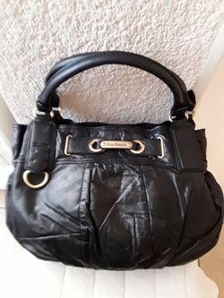 Juicy Couture black leather handbag.