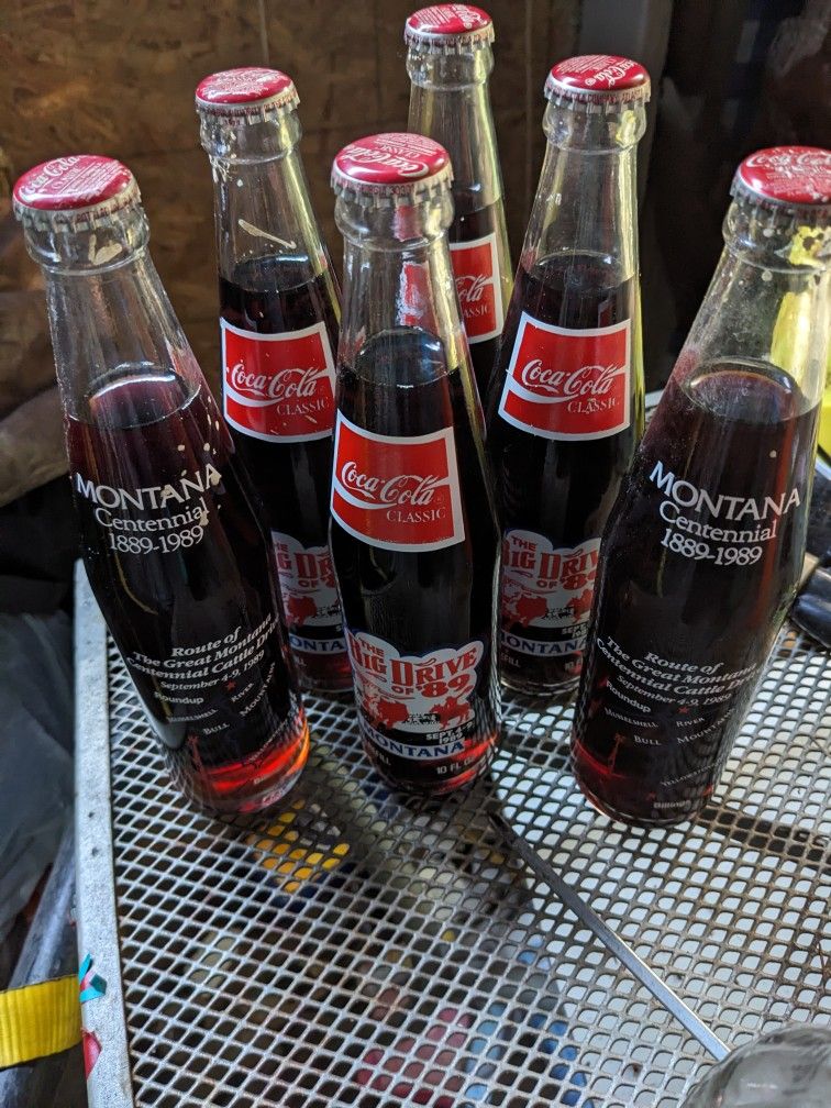 Vintage 1989 Montana Centennial Coca-Cola Bottles – 6 Unopened + 4 Clear 10oz (3 Full, 1 Empty)