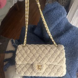 shepra flap bag with gold hardware 