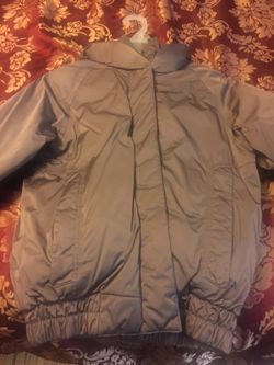 Woman north face jacket in gray condition