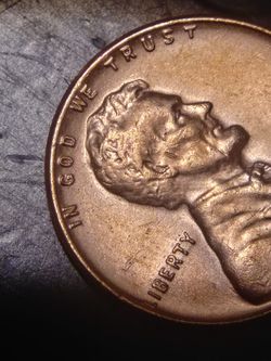 1957 D cracked skull and JB on his head