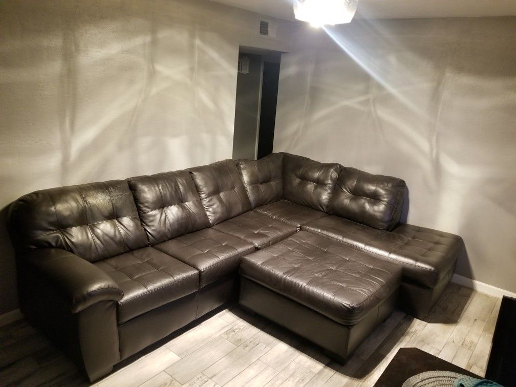 Black Faux Leather Sectional Couch with Ottoman