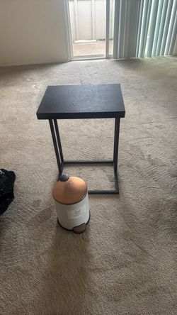 small trash can and night stand
