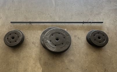 Barbell and Weights 4 10 lbs & 2 25 lbs