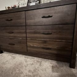 Brown Willow Creek 6 Drawer Dresser   Features six spacious dovetail drawers for ample storage  Dimensions	60"W x 16"D x 36"H Package Dimensions	62.2"