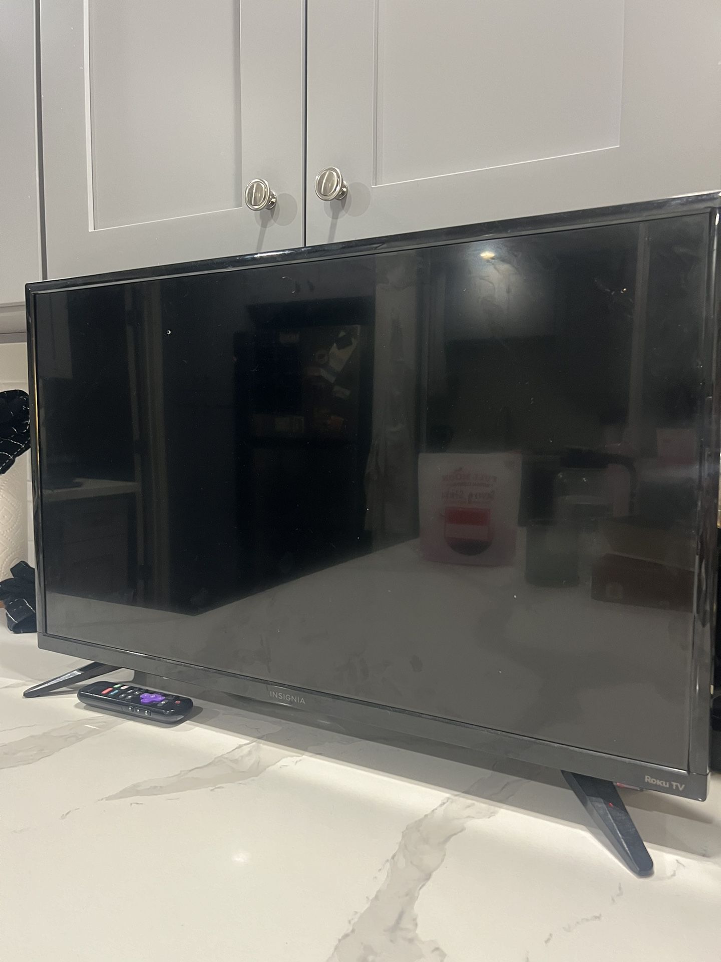 29” TV and Roku Remote
